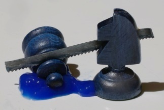 Chess knight sawing pawn