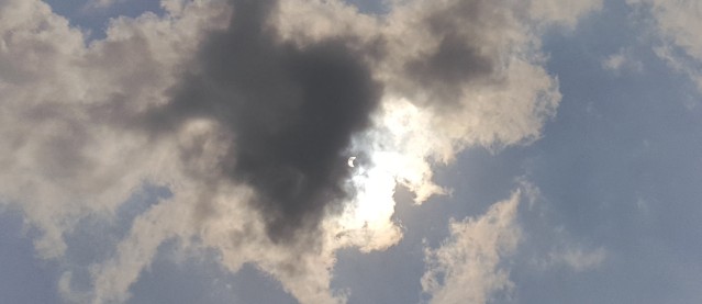 The eclipse viewed from a cell phone